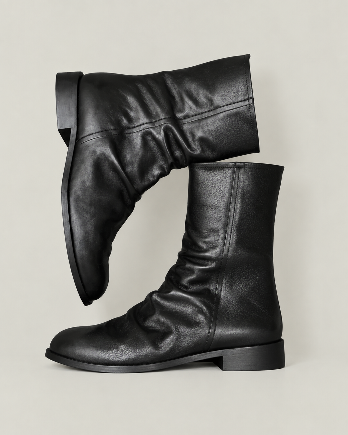 CREASED LEATHER BOOTS